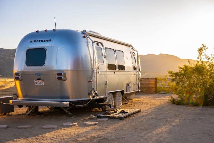 RV parked and ready in the sunset.